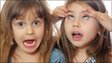 Young girls making faces